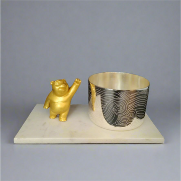 Wave Detailing Bowl with Golden Teddy on white Marble