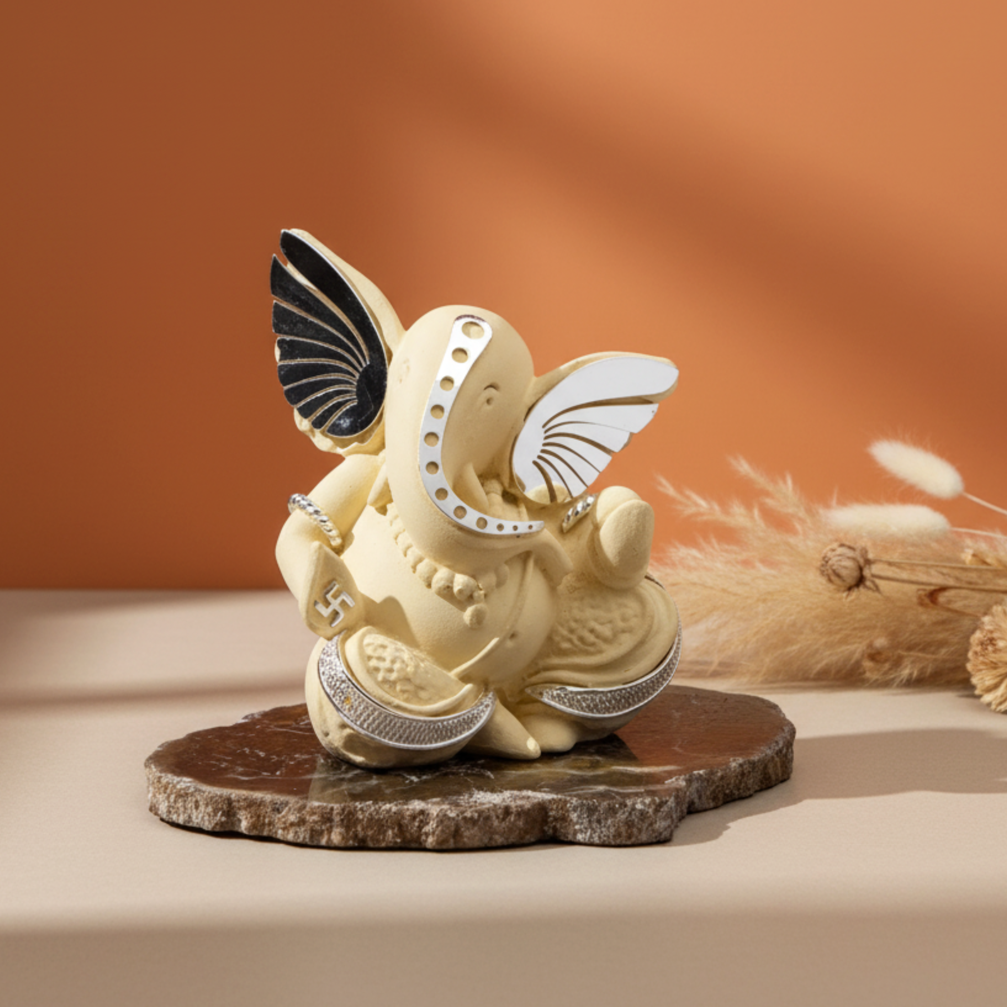 Ivory Ganesha on Petrified Stone - Eluni...