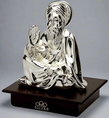 Silver Guru Nanak Dev on wood base